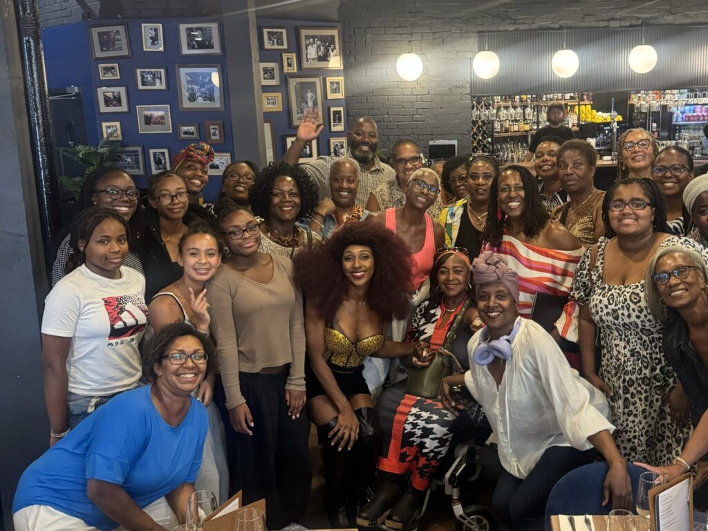 Alexandra Burke with members of The Arts & Culture Group at a get-together with Elaine Grant